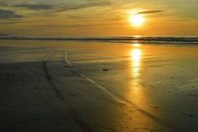 Scenic view of sea at sunset