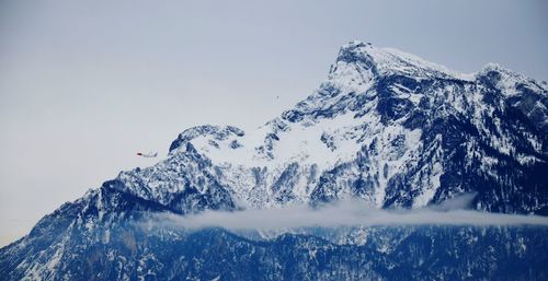 Low angle view of european alps against sky