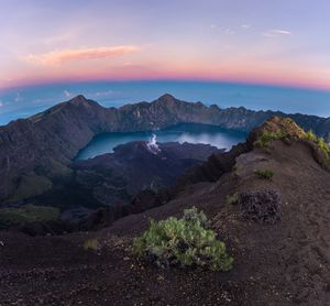 Scenic view of mountains against sky during sunset