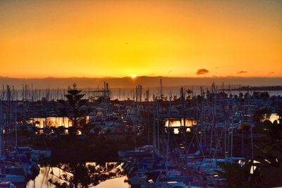 Scenic view of sea against orange sky