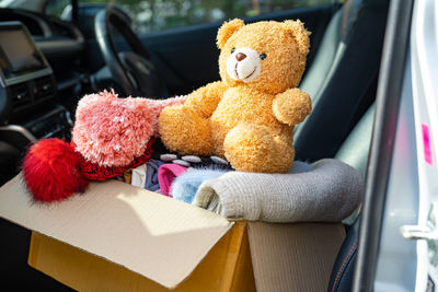 Close-up of stuffed toy in car