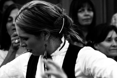 Smiling woman dancing during festival