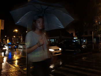 Cars on street at night