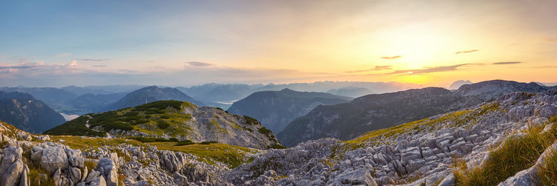 Panoramic view of mountains against sky during sunset