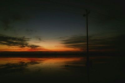 Scenic view of sunset over river