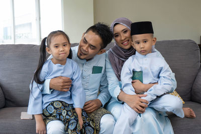 Group of people sitting on floor