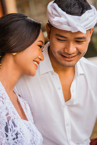 Side view of young woman looking away