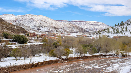 Small village in the atlas mountains after winter snow, ouarzazate province, morocco