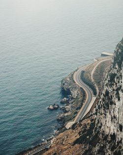 High angle view of road by sea against sky