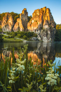 Reflection of rock in lake water