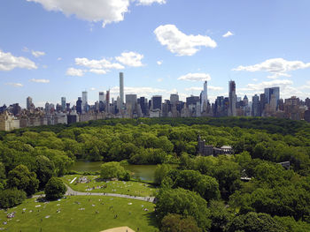 Buildings in city against sky