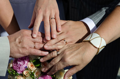 Close-up of people holding hands