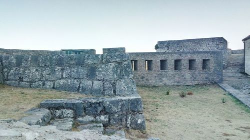 Old ruin building against clear sky