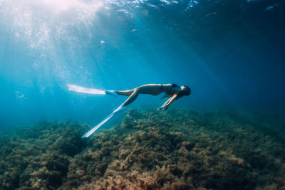 Man swimming in sea