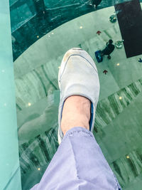 Low section of man in swimming pool