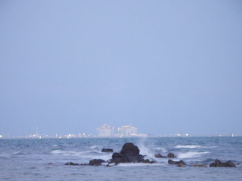 Scenic view of sea against clear sky