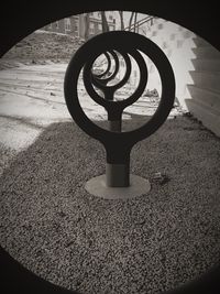 Close-up of circular object on wall