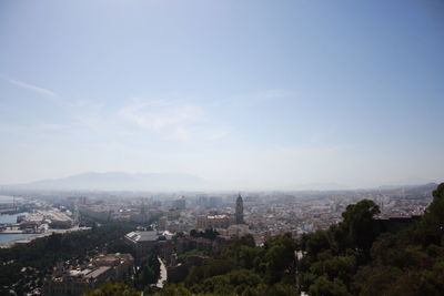 High angle view of buildings in city against sky