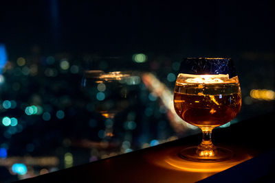 Close-up of wine glass on table