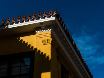 Low angle view of roof against sky