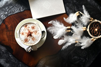 High angle view of coffee on table