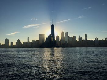 City skyline with sea in background