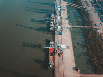 High angle view of buildings by sea