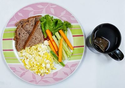 High angle view of breakfast served on table