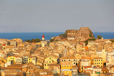 Buildings in city against sky