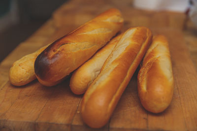 Close-up of baguettes on cutting board