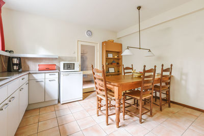 Empty chairs and tables in bathroom