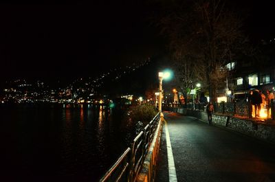 Illuminated street lights at night