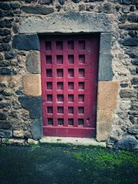 Close-up of window on brick wall