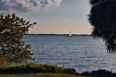 Scenic view of sea against sky at sunset