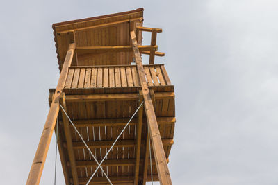 Low angle view of construction site against sky