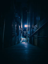 A man walking in the city at night