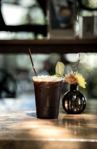 Close-up of beer glass on table