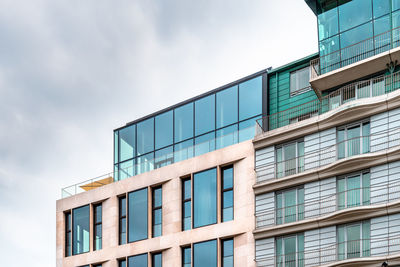 Low angle view of modern building against sky