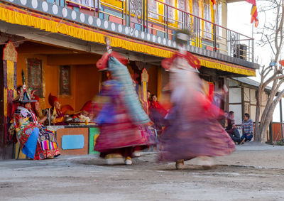 People walking on street in city