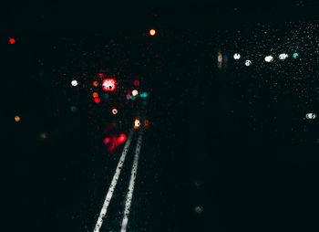 Cars on road at night