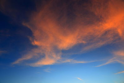 Low angle view of dramatic sky during sunset