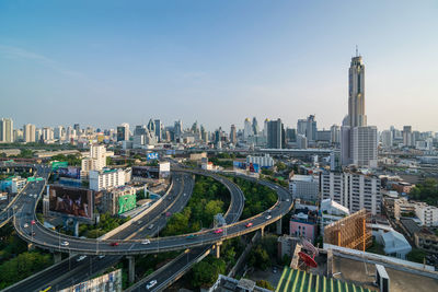 High angle view of buildings in city against sky