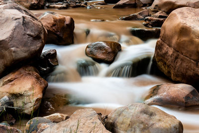 Close-up of rocks in water