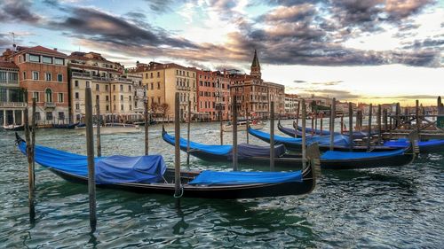 Boats moored in canal