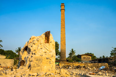 Panoramic view of historical building against blue sky