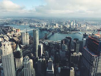 Aerial view of cityscape against sky