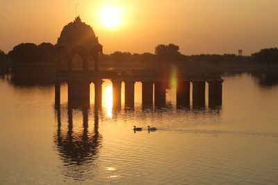 View of lake at sunset