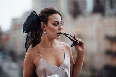 Portrait of beautiful woman holding a outdoors