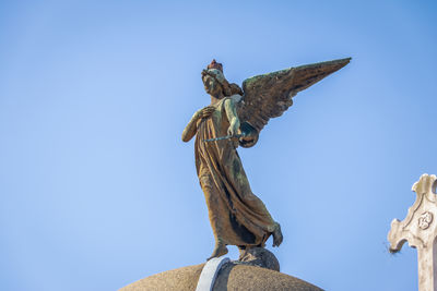 Low angle view of statue against clear sky