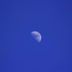 Moon in blue sky